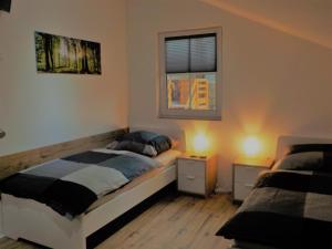 Postel nebo postele na pokoji v ubytování Gästezimmer Fechheim