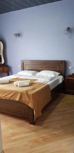 Postel nebo postele na pokoji v ubytování Guest house Likani 2017