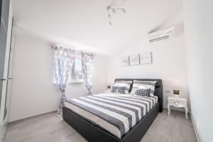 Postel nebo postele na pokoji v ubytování Luxury Villa FUTURE