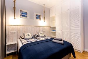 Postel nebo postele na pokoji v ubytování Saltwater Apartment