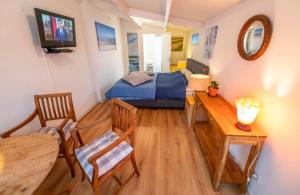 TV a/nebo společenská místnost v ubytování Studio Ana- Hata (vanuit het Hart ❤)