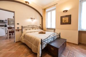 En eller flere senger på et rom på B&B Borgo Cortese