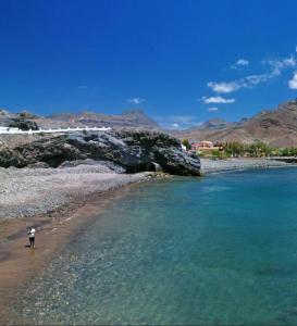 Playa de o cerca de esta habitación en casa particular