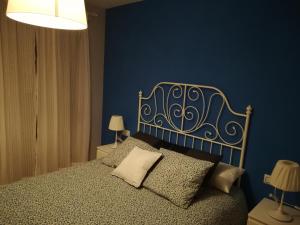 A bed or beds in a room at Apartamento La Muralla de Teruel