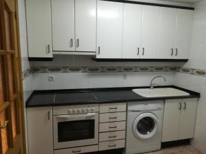 A kitchen or kitchenette at Apartamento La Muralla de Teruel