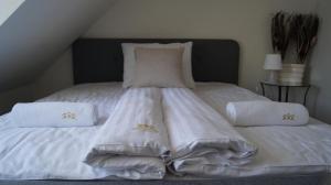 Posteľ alebo postele v izbe v ubytovaní Szczawnica Apartament Kaja