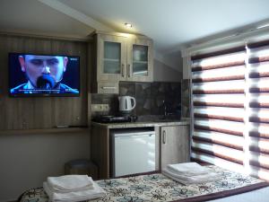 Kuchyň nebo kuchyňský kout v ubytování Street61 Apart Hotel