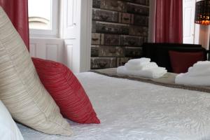 Ein Bett oder Betten in einem Zimmer der Unterkunft Almada Porto Downtown - by Guest SPA