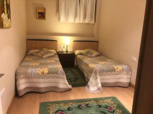 Ένα ή περισσότερα κρεβάτια σε δωμάτιο στο Apartamento con jardin +18 φωτογραφίες