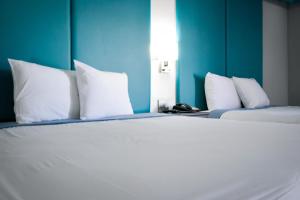 Postel nebo postele na pokoji v ubytování Tilbury Inn