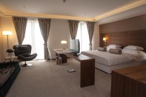 Una cama o camas en una habitación de Hotel Aurel