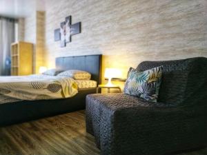 Cama ou camas em um quarto em 1-к квартира Rise & Shine 33 Mikrorayon