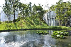 a rendering of a pond in front of a building at The Capitol Hotel Tokyu in Tokyo