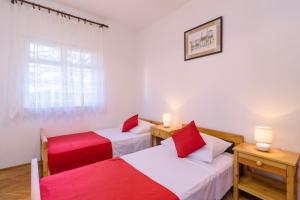 Postelja oz. postelje v sobi nastanitve Apartment "Duma"