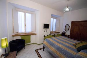 Letto o letti in una camera di San Leo Albergo Diffuso
