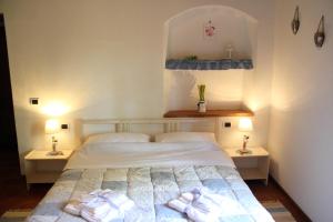 Giường trong phòng chung tại Podere Fichereto Tuscany apartment in Florence countryside