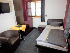 TV a/nebo společenská místnost v ubytování Hotel Leonhardihof