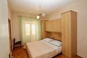 Cama o camas de una habitación en Apartments Mate Slavic