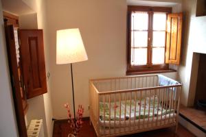 Postel nebo postele na pokoji v ubytování Podere Fichereto Tuscany Apartment in Florence countryside