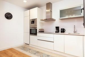 Kuchyň nebo kuchyňský kout v ubytování Akira Flats Urgell apartment