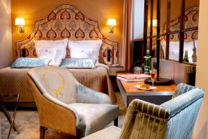Posteľ alebo postele v izbe v ubytovaní Balthazar Design Hotel