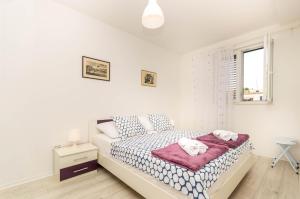Posteľ alebo postele v izbe v ubytovaní Luxury apartment Lucy in center with amazing sea-view