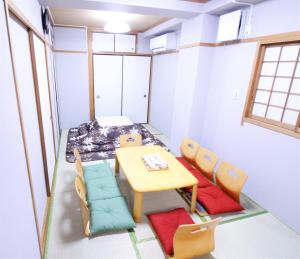 a small room with a table and chairs at Central Field 5-6F in Tokyo