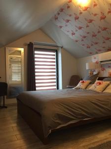 Ένα ή περισσότερα κρεβάτια σε δωμάτιο στο Le Rouge & Blanc