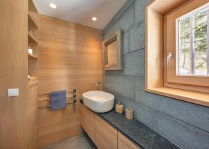 Ванная комната в DAS HAUS IM WALD