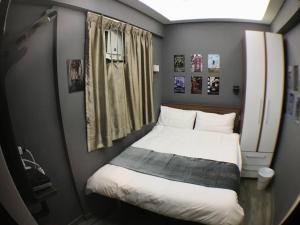 Postelja oz. postelje v sobi nastanitve Soso Hostel