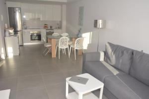 A kitchen or kitchenette at New and cosy apartment - 4 min walk from the beach - La Tejita - El Medano