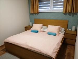 Postel nebo postele na pokoji v ubytování Apartments Relax