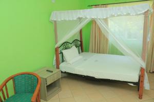 Postel nebo postele na pokoji v ubytování Makwetu Villas + 37 fotografií