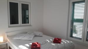 Postel nebo postele na pokoji v ubytování Apartment AnaKatarina