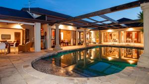 an image of a swimming pool in a house at Manor 38 in Port Elizabeth