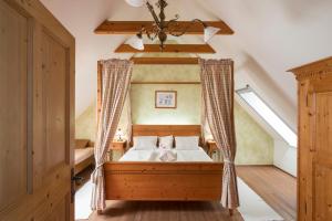 Cama o camas de una habitación en Kürbishof Gartner