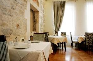 Restoran atau tempat lain untuk makan di Palace Augubio