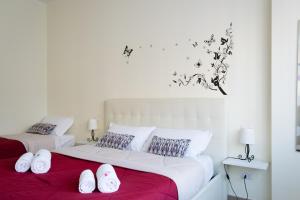 Postel nebo postele na pokoji v ubytování Melibi - Re Lear Apartments