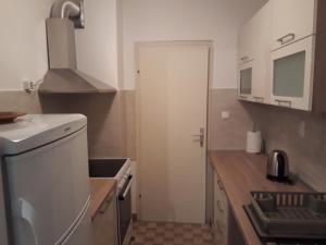 Kuchyň nebo kuchyňský kout v ubytování Apartman Buble