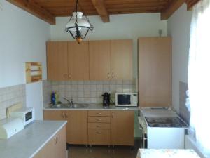 A kitchen or kitchenette at Nosztalgia Vendégház