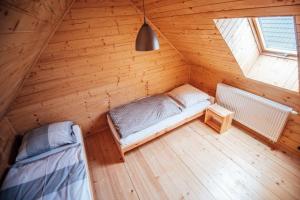 A bed or beds in a room at chalupa matko a kubko