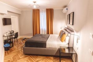 A bed or beds in a room at Relais Della Porta