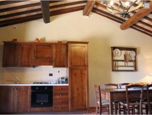Kuchyň nebo kuchyňský kout v ubytování Agriturismo Portoreschi