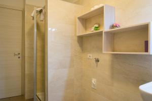Koupelna v ubytování Melibi - Re Lear Apartments