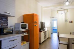 Kuchyň nebo kuchyňský kout v ubytování Melibi - Re Lear Apartments