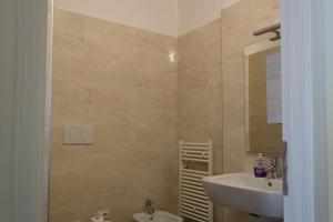 Koupelna v ubytování Melibi - Re Lear Apartments