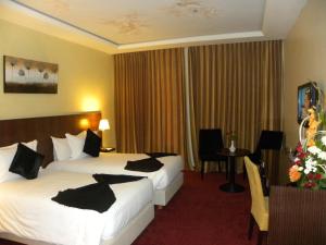 Letto o letti in una camera di Rive Hotel
