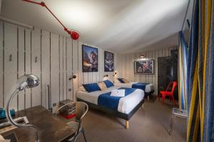 Katil atau katil-katil dalam bilik di Hotel de Paris