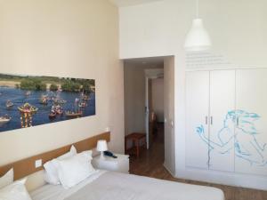 Postel nebo postele na pokoji v ubytování Casa João Chagas Guesthouse, Constância, By Viva a Vida - Alojamentos e Hotels