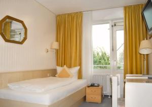 Кровать или кровати в номере Hotel das Miramar
